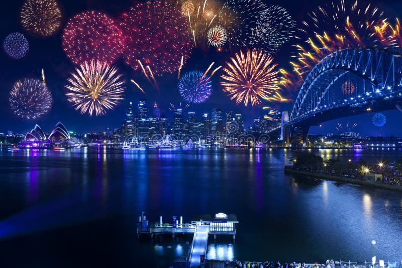 Sydney New Years Eve fireworks with the harbour bridge, city and Opera House in the background. Sydney New Years Eve fireworks with the harbour bridge, city and Opera House in the background