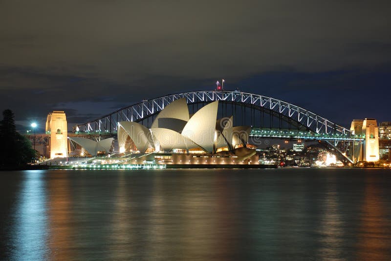 Sydney Opera House with Harbour Bridge at night detail. Sydney Opera House with Harbour Bridge at night detail