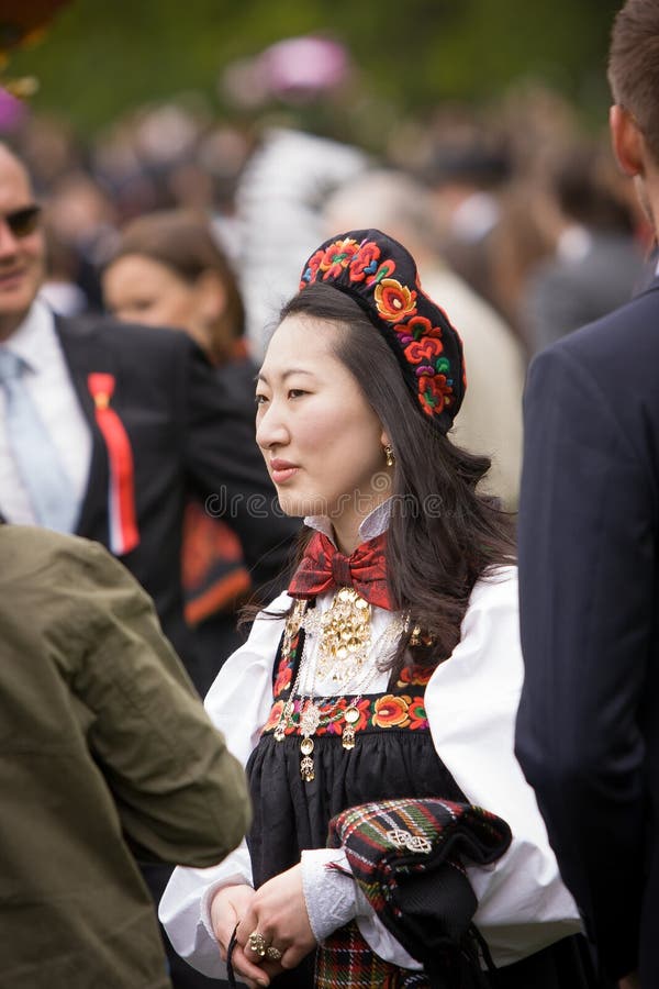 Oslo, Norway - May 17, 2010: National day in Norway. Norwegians at traditional celebration and parade on Karl Johans Gate street. Oslo, Norway - May 17, 2010: National day in Norway. Norwegians at traditional celebration and parade on Karl Johans Gate street.