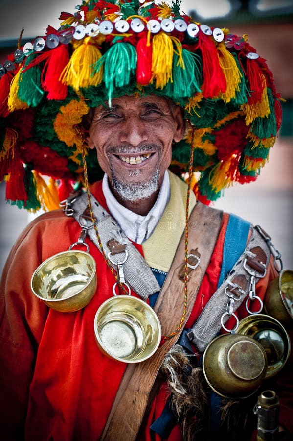 A wide angle portrait of a sweet water seller in marrakech. A wide angle portrait of a sweet water seller in marrakech