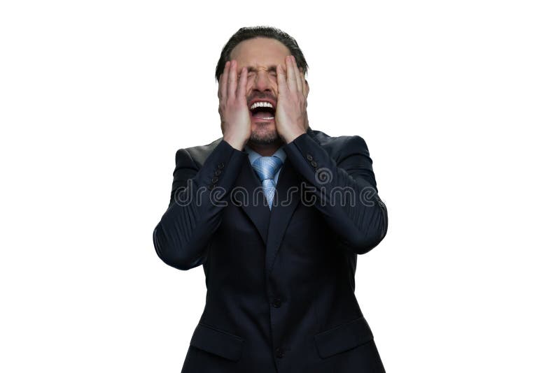 Mature formal-dressed boss is screaming in desperation. Very upset director isolated on white background. Mature formal-dressed boss is screaming in desperation. Very upset director isolated on white background.