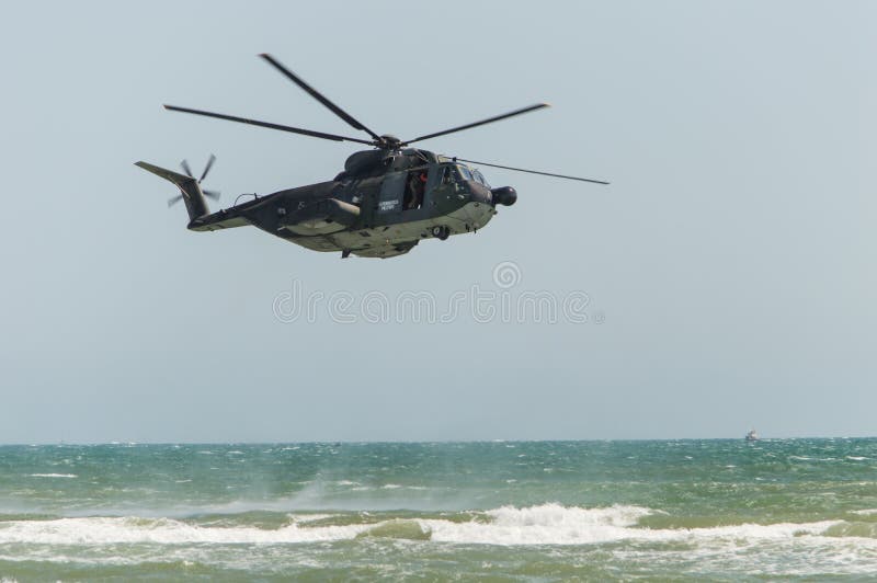 Rome International Air Show 2014. Italian Army Helicopter 1 HH-3F Rescue operation in the sea 29 june 2014, ostia, Rome, Italy. Rome International Air Show 2014. Italian Army Helicopter 1 HH-3F Rescue operation in the sea 29 june 2014, ostia, Rome, Italy