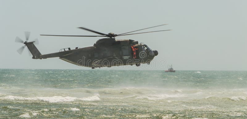 Rome International Air Show 2014. Italian Army Helicopter 1 HH-3F Rescue operation in the sea 29 june 2014, ostia, Rome, Italy. Rome International Air Show 2014. Italian Army Helicopter 1 HH-3F Rescue operation in the sea 29 june 2014, ostia, Rome, Italy