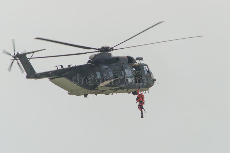 Rome International Air Show 2014. Italian Army Helicopter 1 HH-3F Rescue operation in the sea 29 june 2014, ostia, Rome, Italy. Rome International Air Show 2014. Italian Army Helicopter 1 HH-3F Rescue operation in the sea 29 june 2014, ostia, Rome, Italy