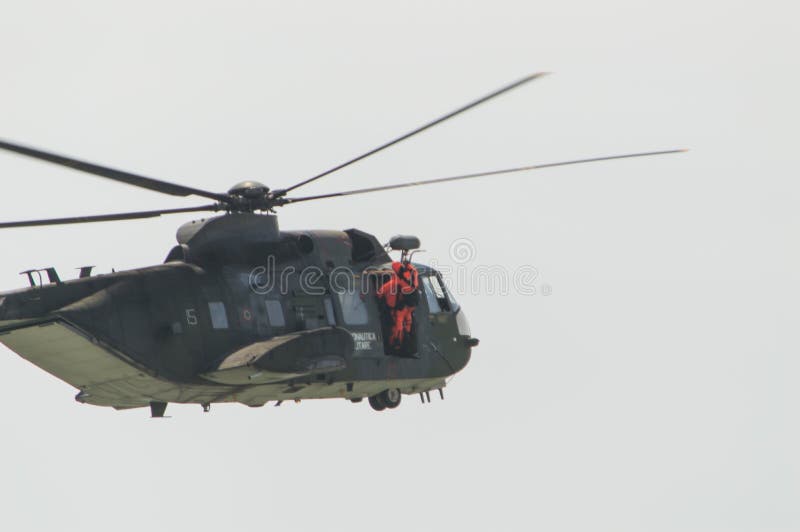 Rome International Air Show 2014. Italian Army Helicopter 1 HH-3F Rescue operation in the sea 29 june 2014, ostia, Rome, Italy. Rome International Air Show 2014. Italian Army Helicopter 1 HH-3F Rescue operation in the sea 29 june 2014, ostia, Rome, Italy