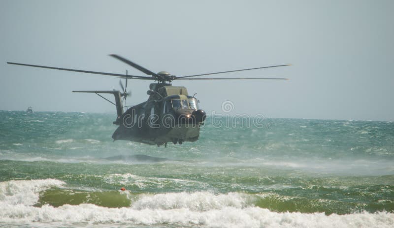 Rome International Air Show 2014. Italian Army Helicopter 1 HH-3F Rescue operation in the sea 29 june 2014, ostia, Rome, Italy. Rome International Air Show 2014. Italian Army Helicopter 1 HH-3F Rescue operation in the sea 29 june 2014, ostia, Rome, Italy