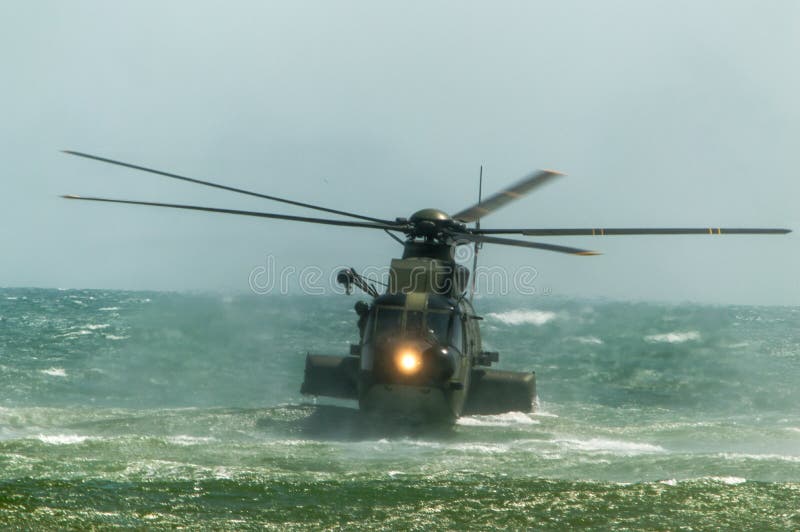 Rome International Air Show 2014. Italian Army Helicopter 1 HH-3F Rescue operation in the sea 29 june 2014, ostia, Rome, Italy. Rome International Air Show 2014. Italian Army Helicopter 1 HH-3F Rescue operation in the sea 29 june 2014, ostia, Rome, Italy