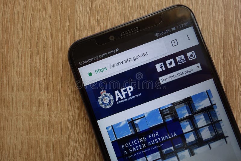 Австралийский федеральный вебсайт полиции AFP официальный показал на современном смартфоне стоковое фото Австралийский федеральный вебсайт полиции AFP официальный показал на современном смартфоне стоковое фото