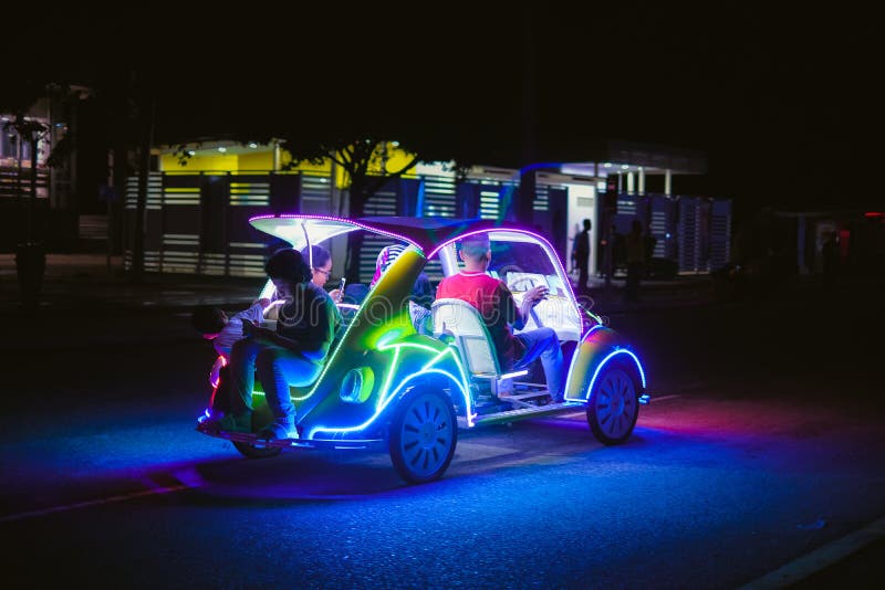 Автомобиль украшения с multicolour неоновыми светами стоковое фото Автомобиль украшения с multicolour неоновыми светами стоковое фото
