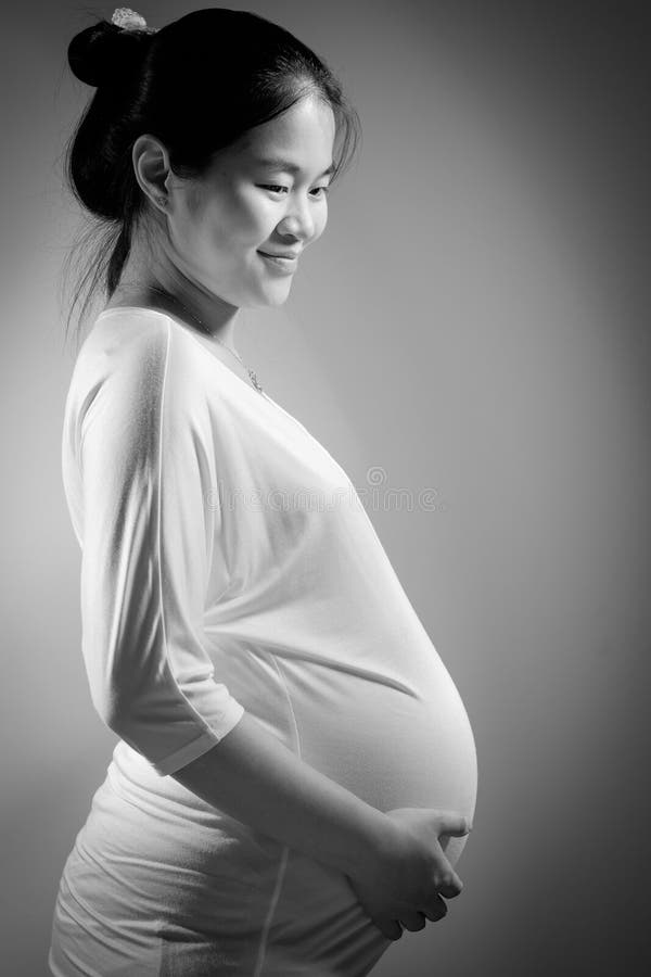 Asian pregnant with white baby