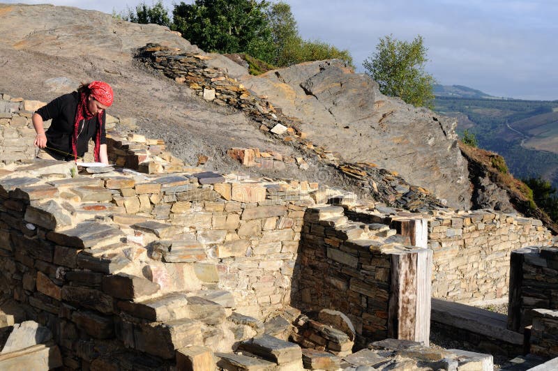 Archaeologist working of the Domus ( 1 st AD ) Archaeological site Chao Samartin Asturias SPAIN. Archaeologist working of the Domus ( 1 st AD ) Archaeological site Chao Samartin Asturias SPAIN