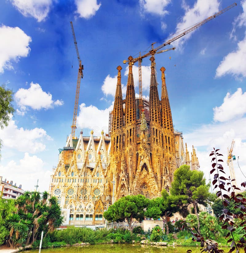 The Basilica of La Sagrada Familia against blue sky. Barcelona, Catalonia. The Basilica of La Sagrada Familia against blue sky. Barcelona, Catalonia