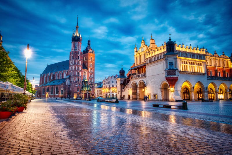 St. Mary`s Basilica on the Krakow Main Square at Dusk, Krakow, Poland. St. Mary`s Basilica on the Krakow Main Square at Dusk, Krakow, Poland