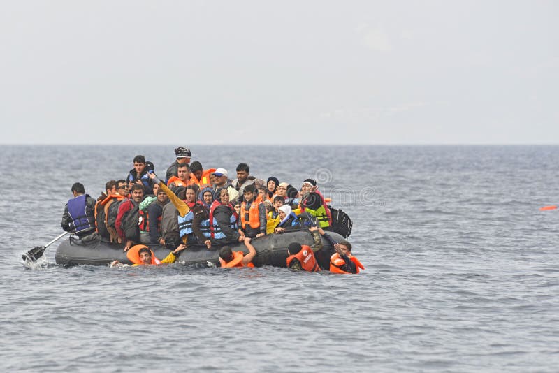 Lesvos, Greece- October 05, 2015. Refugee migrants, arrived on Lesvos in inflatable dinghy boats, they stay in refugee camps waiting for the ferry to mainland Greece continuing their journeys through Europe to seek asylum. Lesvos, Greece- October 05, 2015. Refugee migrants, arrived on Lesvos in inflatable dinghy boats, they stay in refugee camps waiting for the ferry to mainland Greece continuing their journeys through Europe to seek asylum.