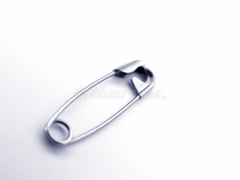 Safety Pin isolated on white background. Safety Pin isolated on white background