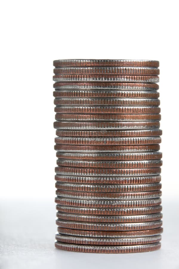 Pile of US qurters coins on white background, sideways. Pile of US qurters coins on white background, sideways