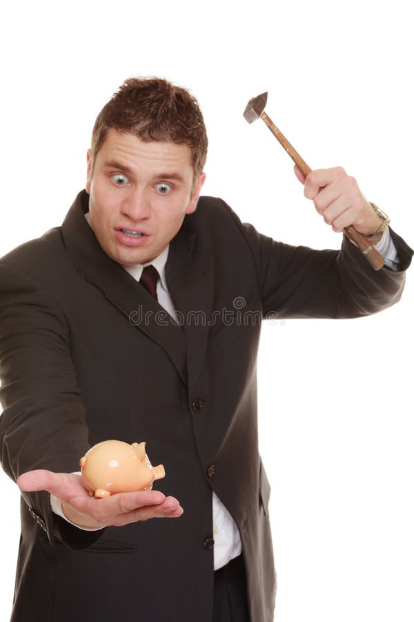 Money saving concept. Nerdy funny business man guy with hammer about to smash piggy bank isolated on white. Money saving concept. Nerdy funny business man guy with hammer about to smash piggy bank isolated on white