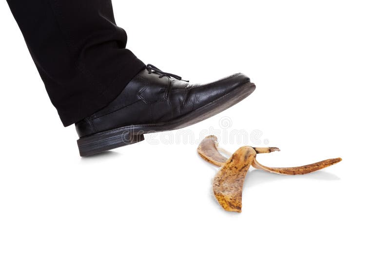 Businessman slipping on banana peel. on white. Businessman slipping on banana peel. on white