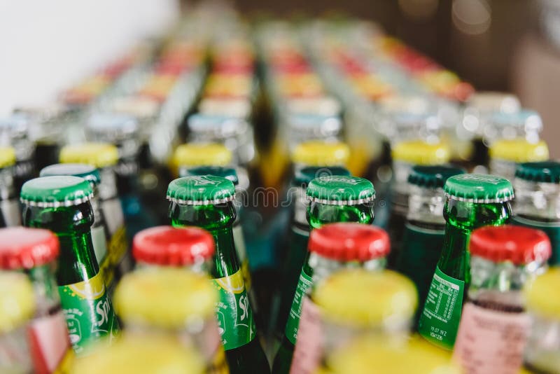 Valencia, Spain - March 2, 2019: Group of lined bottles of Sprite soft drinks. Valencia, Spain - March 2, 2019: Group of lined bottles of Sprite soft drinks.