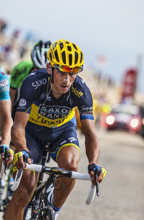 Mont Ventoux, France- July 14 2013: The Czech cyclis Roman Kreuziger (Team Saxo Thinkoff), climbing the last kilometer of the ascension to Mont Ventoux during the stage 15 of the 100 edition of Le Tour de France 2013. Mont Ventoux, France- July 14 2013: The Czech cyclis Roman Kreuziger (Team Saxo Thinkoff), climbing the last kilometer of the ascension to Mont Ventoux during the stage 15 of the 100 edition of Le Tour de France 2013.