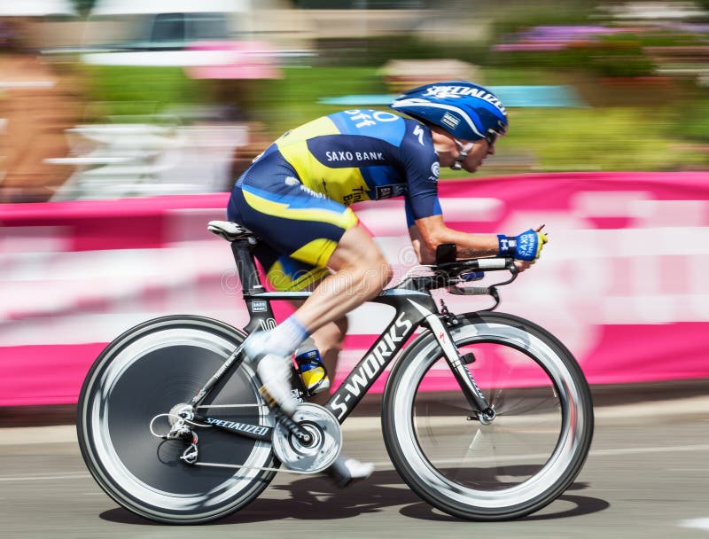 Beaurouvre,France, July 27 2012:Paning image of the Belgian cyclist Nuyens Nick (Team Saxo-Bank Thinkoff Bank) riding during the 19th stage- a time trial between Bonneval and Chartres- of Le Tour de France 2012. Beaurouvre,France, July 27 2012:Paning image of the Belgian cyclist Nuyens Nick (Team Saxo-Bank Thinkoff Bank) riding during the 19th stage- a time trial between Bonneval and Chartres- of Le Tour de France 2012.