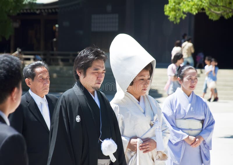 TOKYO, JAPAN, JULY 10: Celebration of a typical wedding in Japan on July 10, 2011 in Tokyo, Japan. The date that most weddings are held in November is the month because the 11 is a lucky number. The wedding is rapid, flow, protocol and little joy. TOKYO, JAPAN, JULY 10: Celebration of a typical wedding in Japan on July 10, 2011 in Tokyo, Japan. The date that most weddings are held in November is the month because the 11 is a lucky number. The wedding is rapid, flow, protocol and little joy.