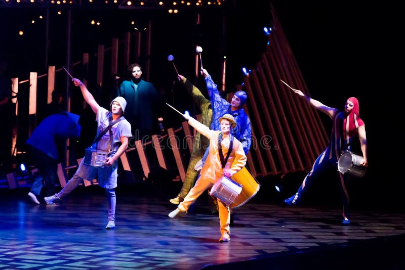 THESSALONIKI, GREECE - OCTOBER, 1, 2014: Performers skipping Rope at Cirque du Soleil's show 'Quidam'. THESSALONIKI, GREECE - OCTOBER, 1, 2014: Performers skipping Rope at Cirque du Soleil's show 'Quidam'