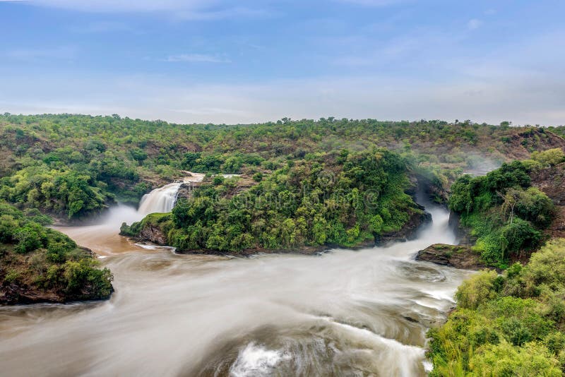 Взгляд Murchison Falls на национальном парке Виктории Нила стоковые изображения rf Взгляд Murchison Falls на национальном парке Виктории Нила стоковые изображения rf
