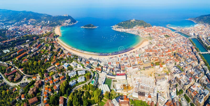 San Sebastian or Donostia aerial panoramic view. San Sebastian is a coastal city in the Basque country in Spain. San Sebastian or Donostia aerial panoramic view. San Sebastian is a coastal city in the Basque country in Spain.