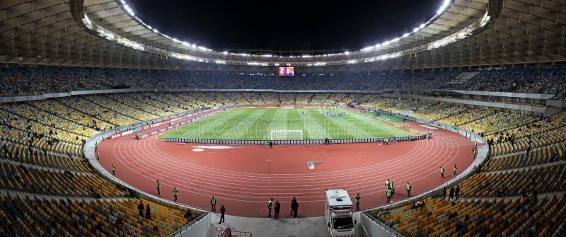 KYIV, UKRAINE - NOVEMBER 11, 2011: Panoramic view of Olympic stadium (NSC Olimpiysky) during friendly football game between Ukraine and Germany on November 11, 2011 in Kyiv, Ukraine. There is 1st game on this stadium after reconstruction. KYIV, UKRAINE - NOVEMBER 11, 2011: Panoramic view of Olympic stadium (NSC Olimpiysky) during friendly football game between Ukraine and Germany on November 11, 2011 in Kyiv, Ukraine. There is 1st game on this stadium after reconstruction