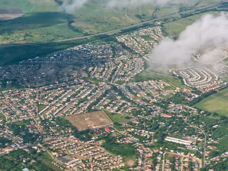 City Bird`s eye view of Portmore, St. Catherine. View from the air in Portmore, Jamaica. City Bird`s eye view of Portmore, St. Catherine. View from the air in Portmore, Jamaica.