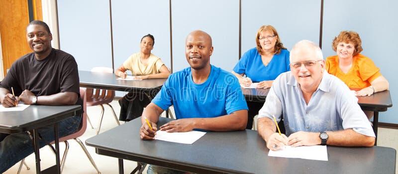 Diverse adult education or college class. Wide angle banner. Diverse adult education or college class. Wide angle banner.