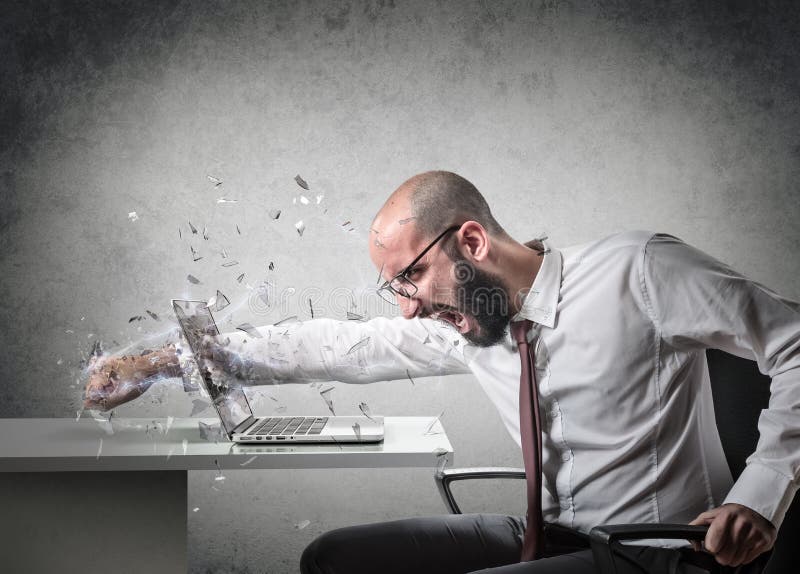 Explosion of anger, man breaks the screen of a computer. Explosion of anger, man breaks the screen of a computer