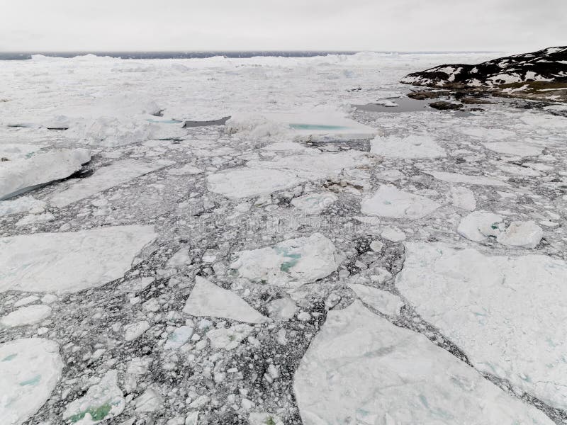 Aeriel view of the huge icebergs on arctic ocean in Greenland. Aeriel view of the huge icebergs on arctic ocean in Greenland