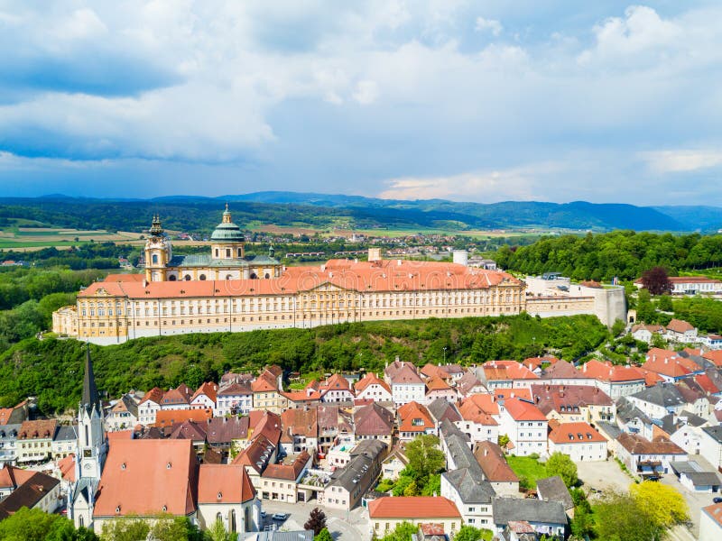 Melk Abbey Monastery aerial panoramic view. Stift Melk is a Benedictine abbey in Melk, Austria. Monastery located on a rocky outcrop overlooking the Danube river and Wachau valley. Melk Abbey Monastery aerial panoramic view. Stift Melk is a Benedictine abbey in Melk, Austria. Monastery located on a rocky outcrop overlooking the Danube river and Wachau valley.