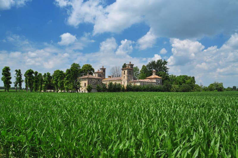 Northern Italian villa (castle) in the Lombardy po plain. Agricultural lanscape, countryside by Cremona. Northern Italian villa (castle) in the Lombardy po plain. Agricultural lanscape, countryside by Cremona.