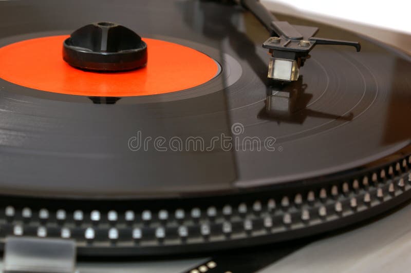 Gramophone vinyl record on player closeup with small depth of field (DOF). Gramophone vinyl record on player closeup with small depth of field (DOF)