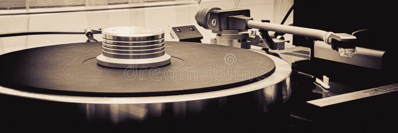 vinyl record player close up, black and white photo. vinyl record player close up, black and white photo.