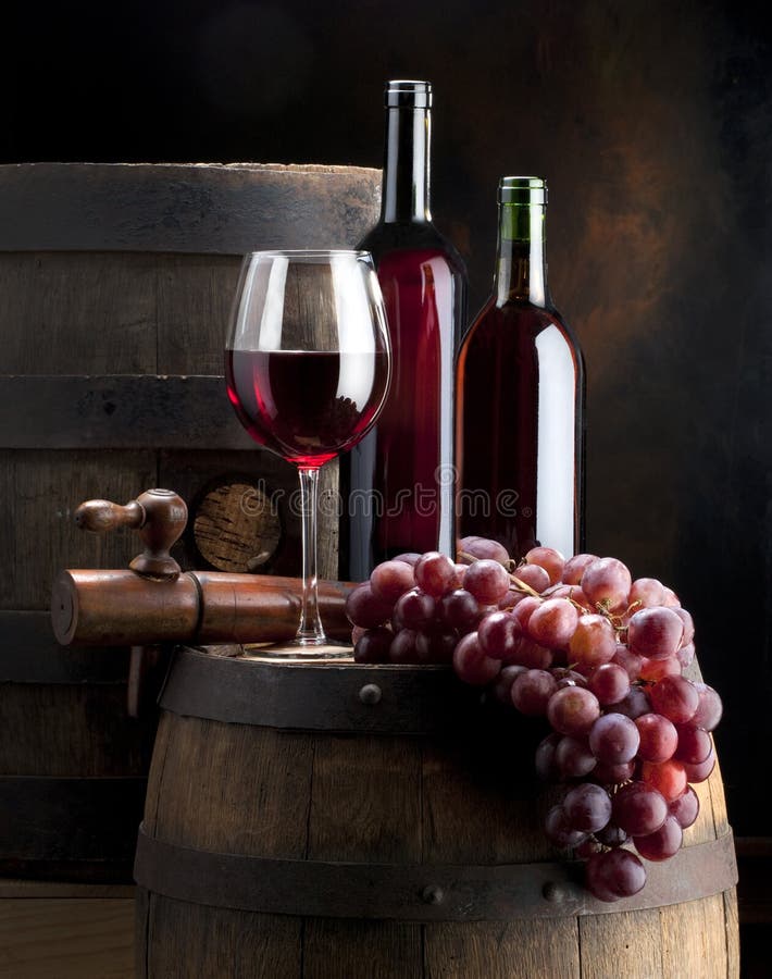 Wine composition with wine cask on background. Wine composition with wine cask on background