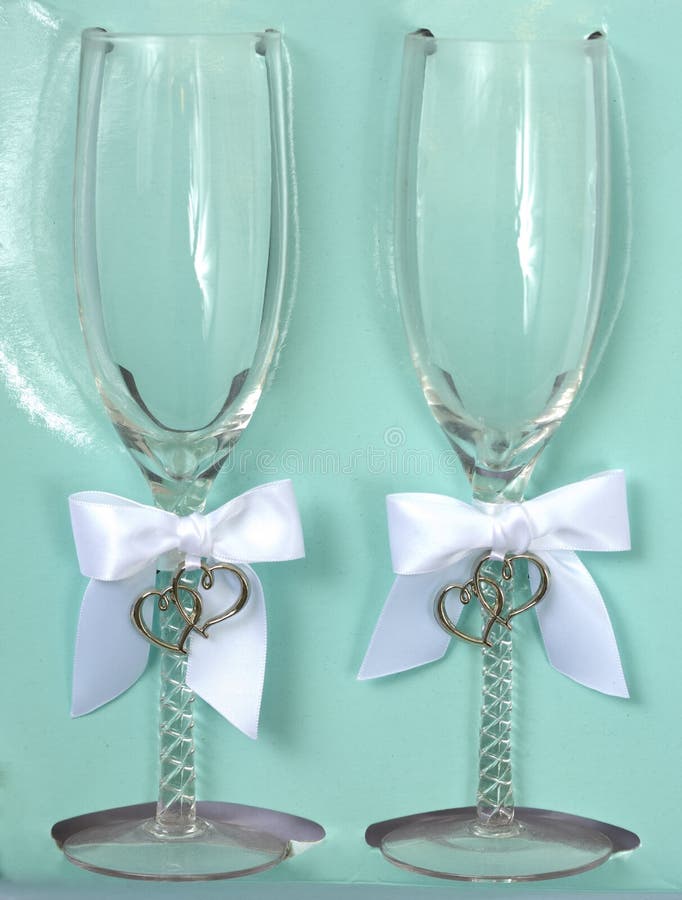 Two wine glasses with hearts anniversary souvenir. Two wine glasses with hearts anniversary souvenir