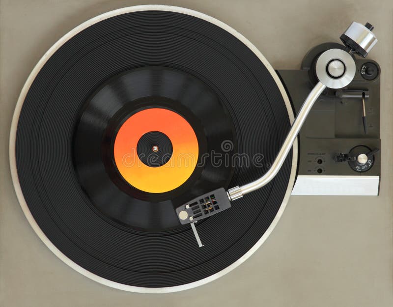 Close up of vintage record player with vinyl record. Music background. Close up of vintage record player with vinyl record. Music background.