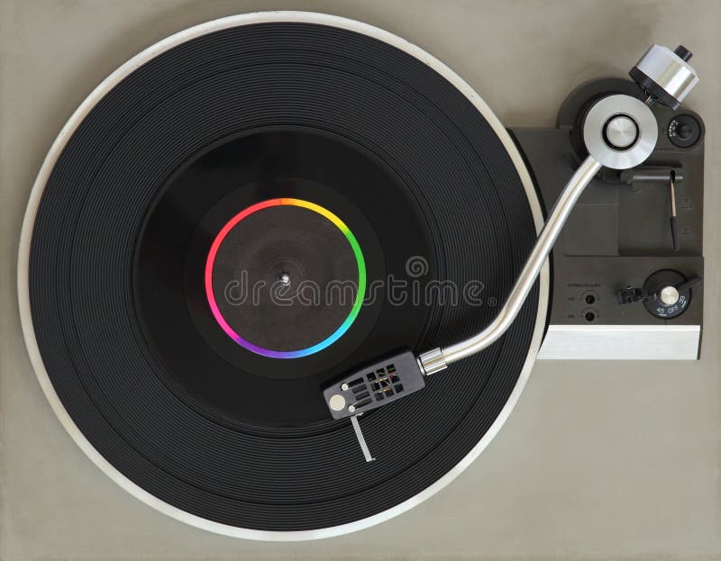 Close up of vintage record player with 45 rpm vinyl record. Close up of vintage record player with 45 rpm vinyl record