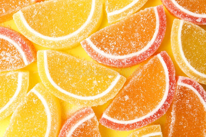 Вкусные конфеты студня на предпосылке цвета стоковые изображения