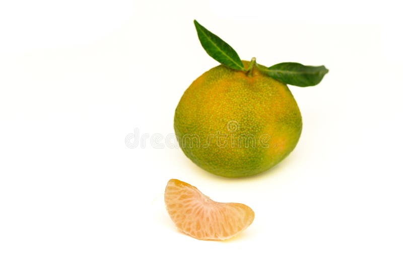 delicious fresh green-orange tangerines on a white background 2. delicious fresh green-orange tangerines on a white background 2