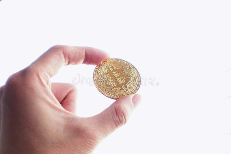 Владение руки bitcoin золота стоковые изображения rf Владение руки bitcoin золота стоковые изображения rf