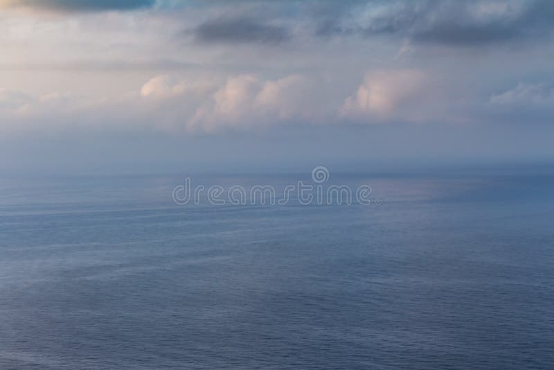 During the dawn, the mist manages to erase the boundary between the sky and the sea. During the dawn, the mist manages to erase the boundary between the sky and the sea.