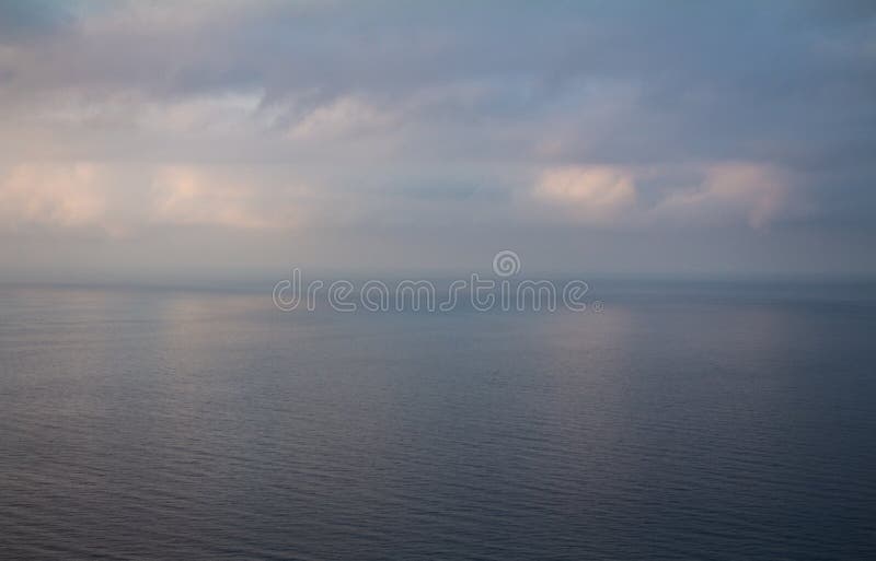 During the dawn, the mist manages to erase the boundary between the sky and the sea. During the dawn, the mist manages to erase the boundary between the sky and the sea.