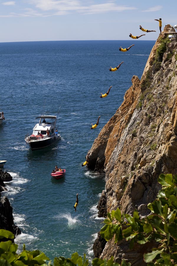 Composite of the famous cliff diver of Acapulco Mexico. The diver jump from the cliffs of La Quebrada from 148 feet and plunge into the water that is only 9 1/2 feet deep. 10 exposures put together show the technique and arch path of the diver. Time-laps Science: shows acelleration of free fall due to gravity. Composite of the famous cliff diver of Acapulco Mexico. The diver jump from the cliffs of La Quebrada from 148 feet and plunge into the water that is only 9 1/2 feet deep. 10 exposures put together show the technique and arch path of the diver. Time-laps Science: shows acelleration of free fall due to gravity