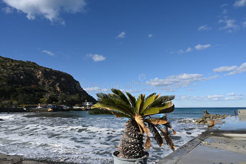 waves on the beach near a restaurant on the Mediterranean coast 1. waves on the beach near a restaurant on the Mediterranean coast 1