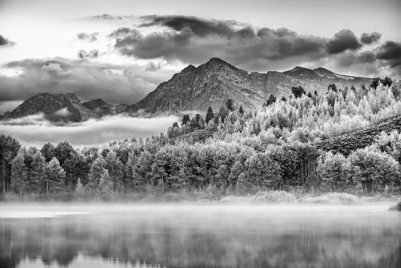 Misty dawn at Oxbow Bend on the Snake River in Wyoming. Misty dawn at Oxbow Bend on the Snake River in Wyoming